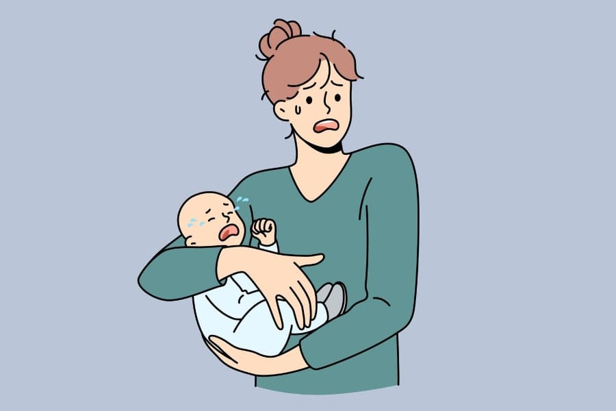 mom struggling with crying baby