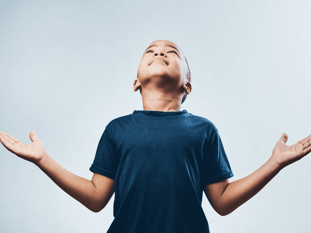 Does God really exist
Young boy looking up to the sky and raising his head, reflecting faith, hope, and curiosity about God. This image represents the question, Does God really exist?—a powerful symbol of seeking biblical proof, logical answers, and the reality of God’s existence.